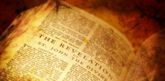 Open book displaying the text of Revelation from the Bible