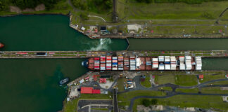 Aerial view of a ship in a canal lock