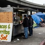 Food truck selling tacos and burritos in an urban setting