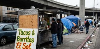 Food truck selling tacos and burritos in an urban setting
