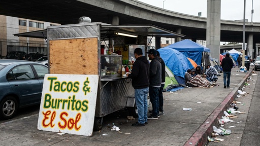 Food truck selling tacos and burritos in an urban setting