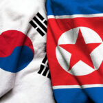 South Korea and North Korea flags side by side.