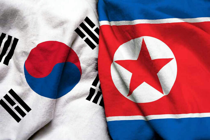 South Korea and North Korea flags side by side.