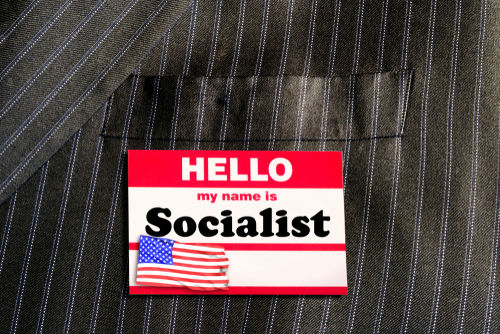 Name tag reading Hello, my name is Socialist.