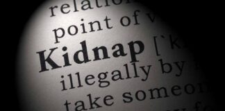 Dictionary entry for the word kidnap in close-up