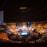 Arena filled with spectators at a UFC event.