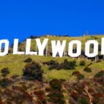 The Hollywood sign on a hillside under a clear blue sky