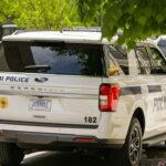 FBI police vehicle parked on a city street