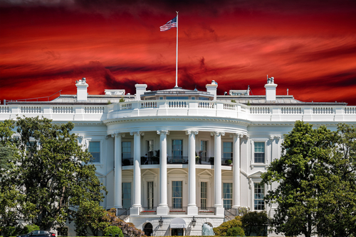 White,House,On,Deep,Red,Sunset,Background The White House with an American flag against a dramatic red sky