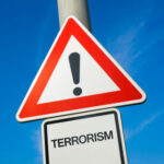 Warning sign indicating terrorism threat