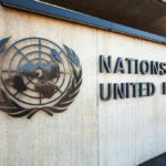 United Nations building entrance with logo and name.