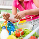 Grocery Prices Set To SKYROCKET After Latest Bill Passed Person shopping for groceries in store.