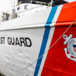 U.S. Coast Guard ship docked at port.