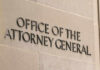 Trump FIRES A.G Sparking Capitol Hill Uproar Office of the Attorney General building sign.