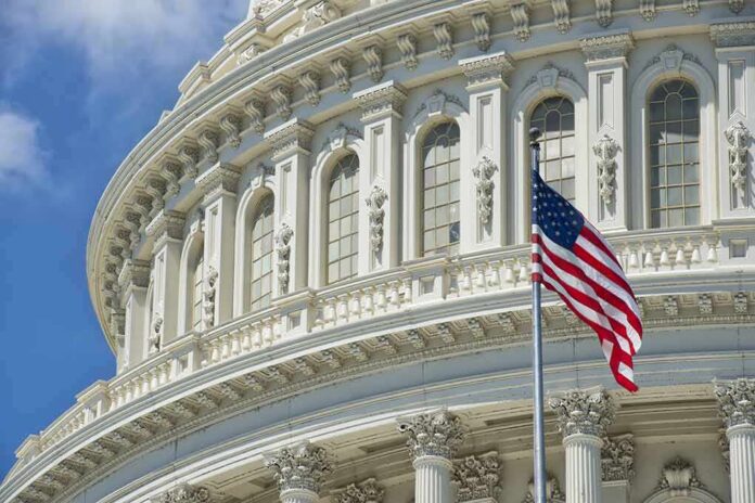 American flag before ornate neoclassical capitol building