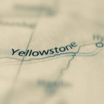 Bison Attack Launches Tourist SKY-HIGH Map showing Yellowstone and surrounding locations.