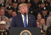 Trump embraces mother whose son was shot and killed, spotlights law enforcement at rally