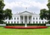 The White House with fountain and red flower bed