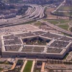 Judges SLAMS Hegseth’s Unconstitutional Ban The Pentagon building seen from above with surrounding highways and parking lots
