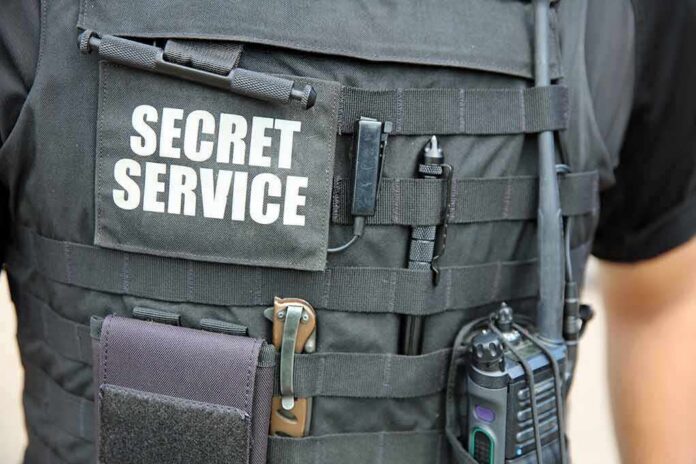 shutterstock_1520321309 Tactical vest with Secret Service patch and gear