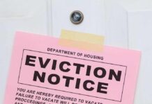 Mamdani’s TOP Advisor Hasn’t Paid Rent in Years! Eviction notice taped to a white door