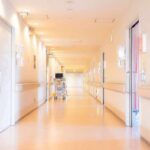Islamist Illegal Found Not Guilty Of Murder Immediately FLEES Country Hospital corridor with doors and medical cart