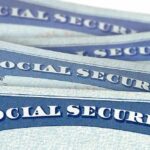 Social Security cards stacked in a close-up view