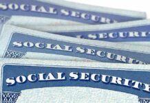 Pentagon Breach Exposes Unknown Number of Troops’ SSN’s Social Security cards stacked in a close-up view