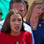 AOC Breaks 2028 Silence – All Or Nothing Celines Toribio speaking at an outdoor event with people standing behind her