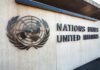 United Nations emblem and signage on a concrete wall