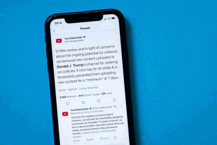 smartphone displaying a social media thread on a blue background