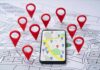 Travel App EXPOSES U.S Troops Smartphone with map app surrounded by red location pins