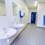 Public restroom with sinks and urinals