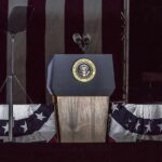 Presidential podium with microphones and teleprompters