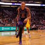 WNBA Clown Show – Player Attacks Fan Mid-Game! Brittney Griner driving to the basket during a basketball game