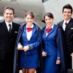 Iran Assassination Threat Causes Secret Service Chaos! Airline crew standing together on the tarmac
