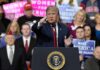 Trump Rally Descends Into Chaos, Hecklers KICKED OUT Donald Trump speaking at a rally podium, pointing toward the audience
