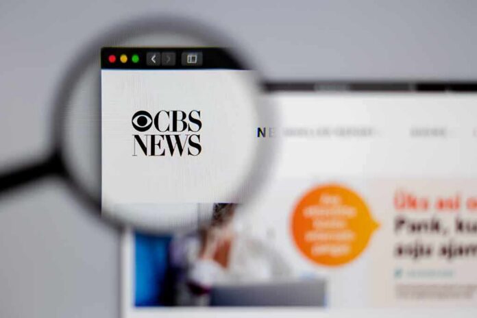Magnifying glass focusing on CBS News website logo