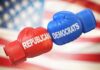 Boxing gloves labeled Republicans and Democrats bump together