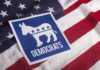 Senate Candidate Says If She Wins She Will Arrest Trump and Jail Her Opponent Democratic Party donkey symbol on American flag