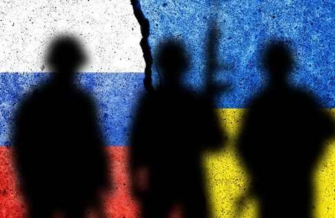 Silhouetted soldiers with Russian and Ukrainian flags background.