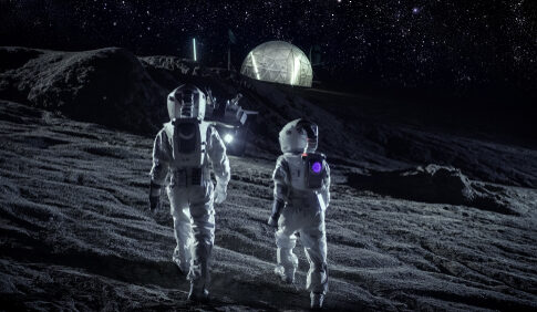 Two astronauts walking on the moon with a dome structure in the background