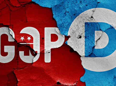 Red GOP logo and blue Democrat logo on cracked wall.