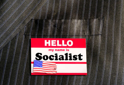 Name tag reading Hello, my name is Socialist.